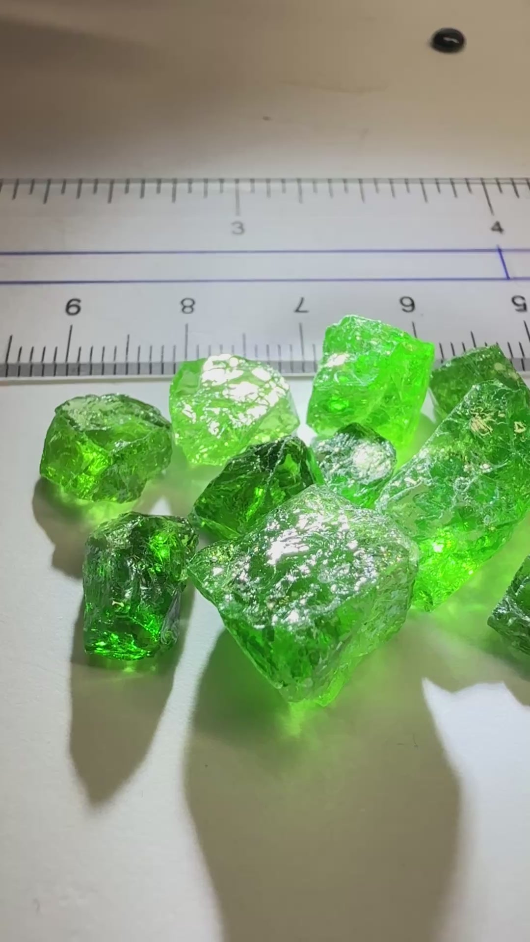 Tsavorite Lot, 61.75ct, Tanzania, Untreated, Unheated, this lot has veils and some pieces require some cobbing, if you know tsavorite you know what I’m talking about, many of the veiled, you can cut as is. See the videos for clarify magnification