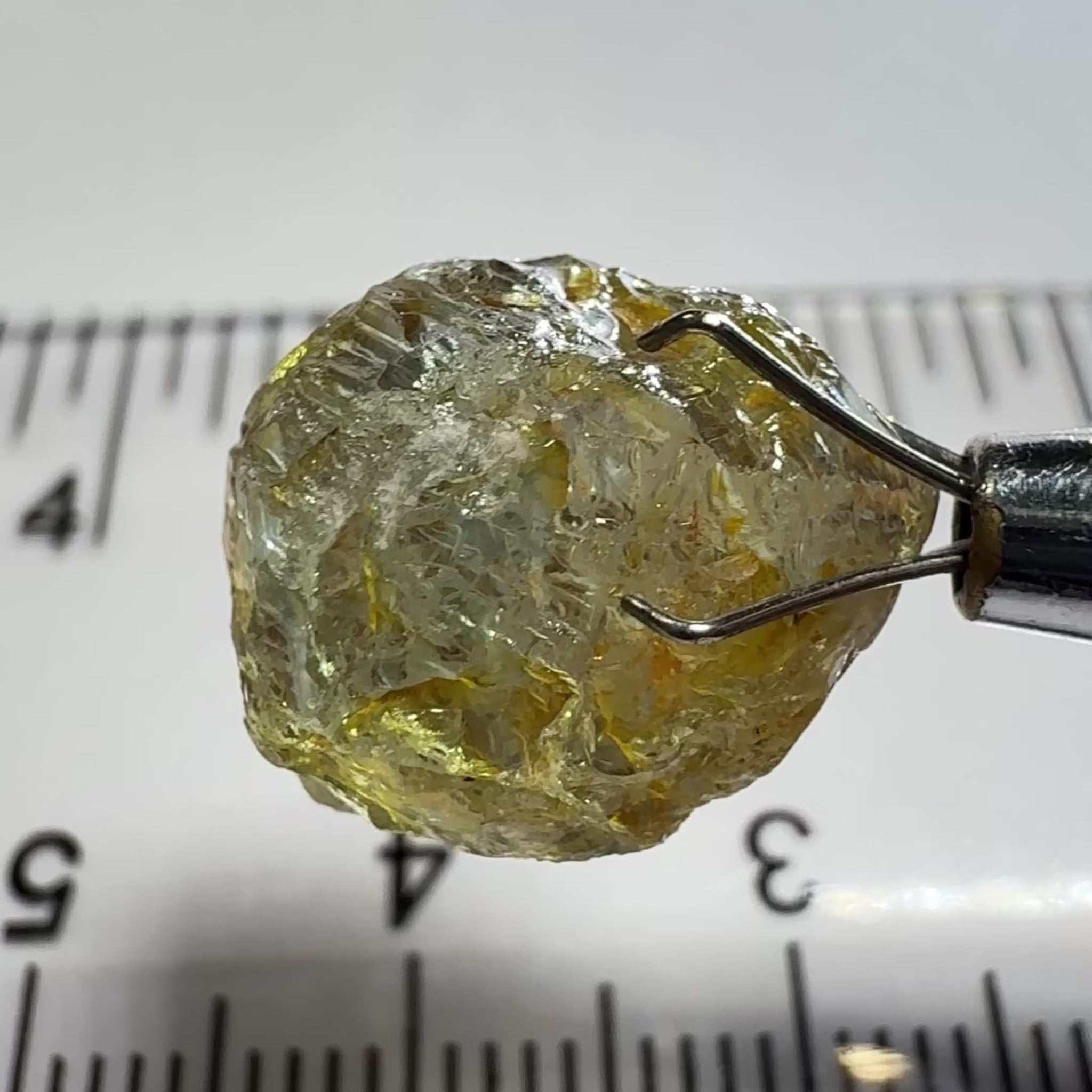 Umba Sapphire, 14.22ct, Umba Valley, Tanzania, Untreated Unheated. Very slight inclusion on the outside skin that will need to be removed before faceting, rest are needles, see videos backlit