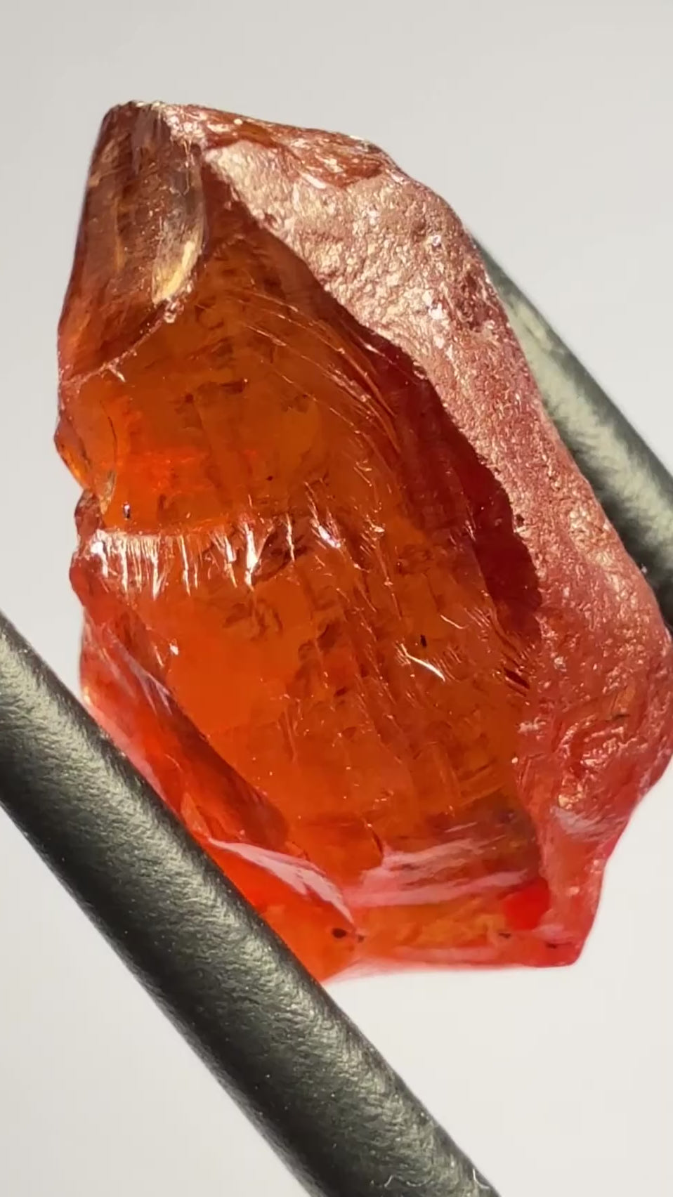 Malaya Garnet, 12.25ct, Super rare size, Tanzania, Untreated Unheated. Just faint parallel silk lines, I have backlit some photos so you can see the silk cannot be seen by the naked eye, very vivid bright colour