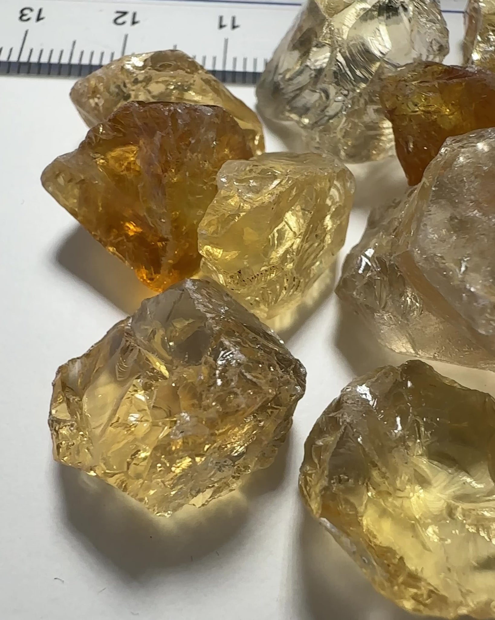 Citrine (Zambian). cracks coming into the stones. 10ct (2gm) to 30ct (6gm) pieces. sold in blind pour basis price is per piece
