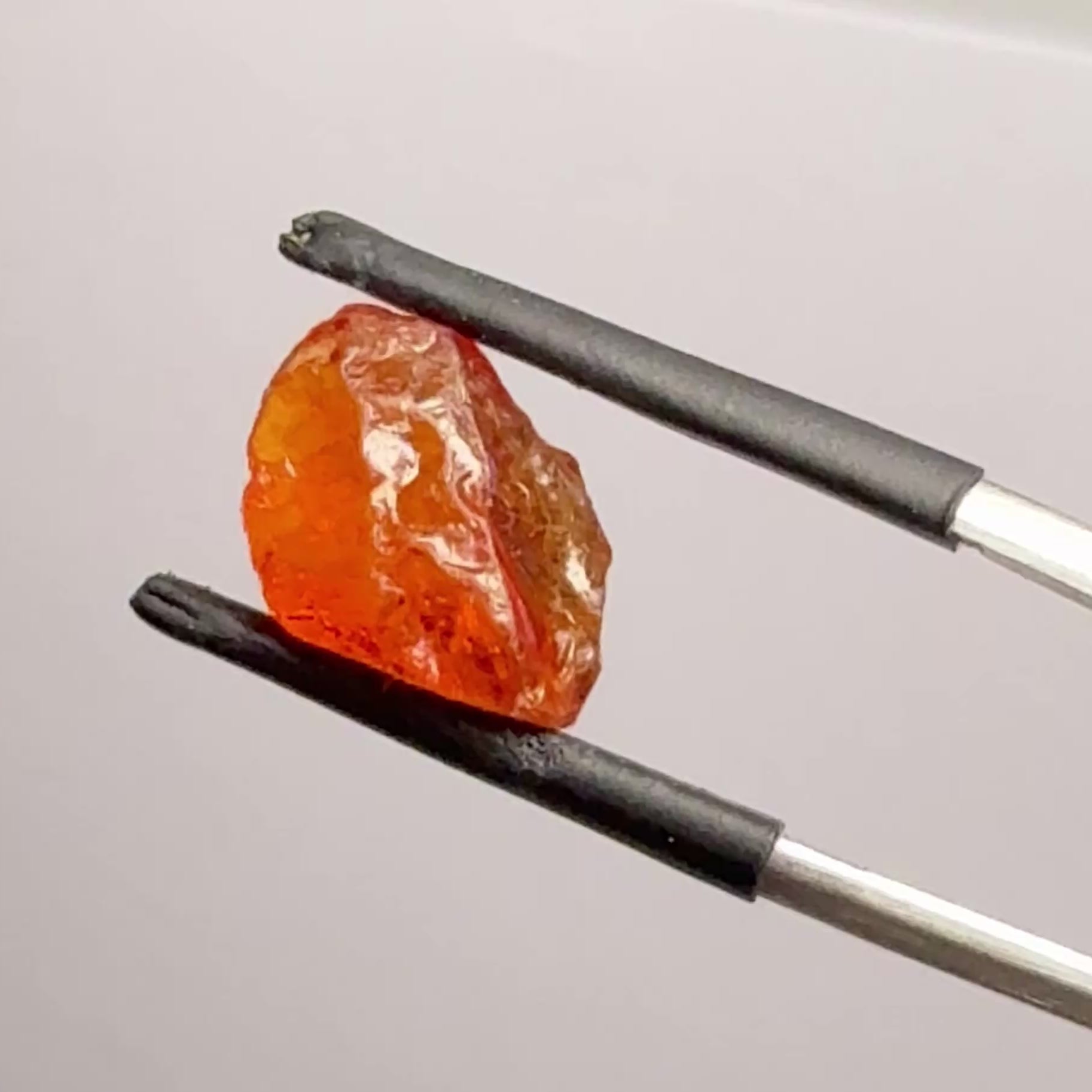 Mandarin Carrot Colour Spessartite Garnet, 5.51ct, Loliondo, Tanzania. Untreated Unheated. Slight crack on outside coming 2mm into stone, rest very slight sugar