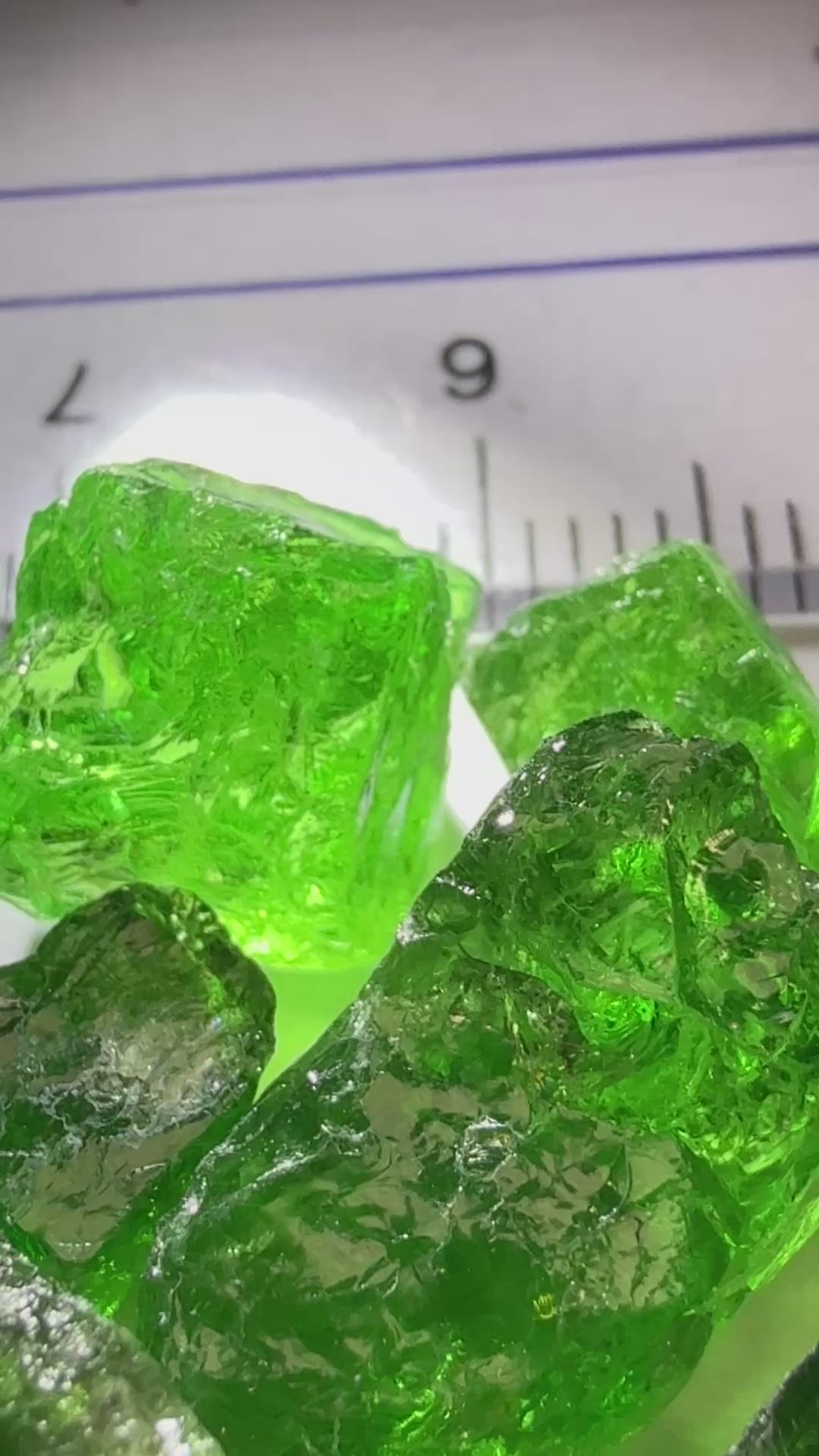 Tsavorite Lot, 61.75ct, Tanzania, Untreated, Unheated, this lot has veils and some pieces require some cobbing, if you know tsavorite you know what I’m talking about, many of the veiled, you can cut as is. See the videos for clarify magnification