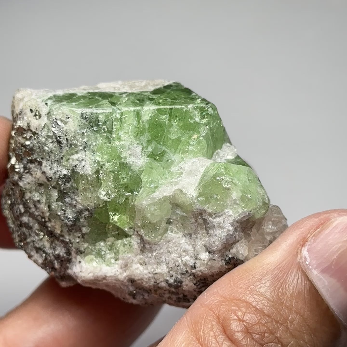 Tsavorite Crystal With Tanzanite And Pyrite on Matrix, 84.30gm / 421.50ct, Merelani, Tanzania. 47 x 36 x 39mm Gem portions and sharp point on crystals