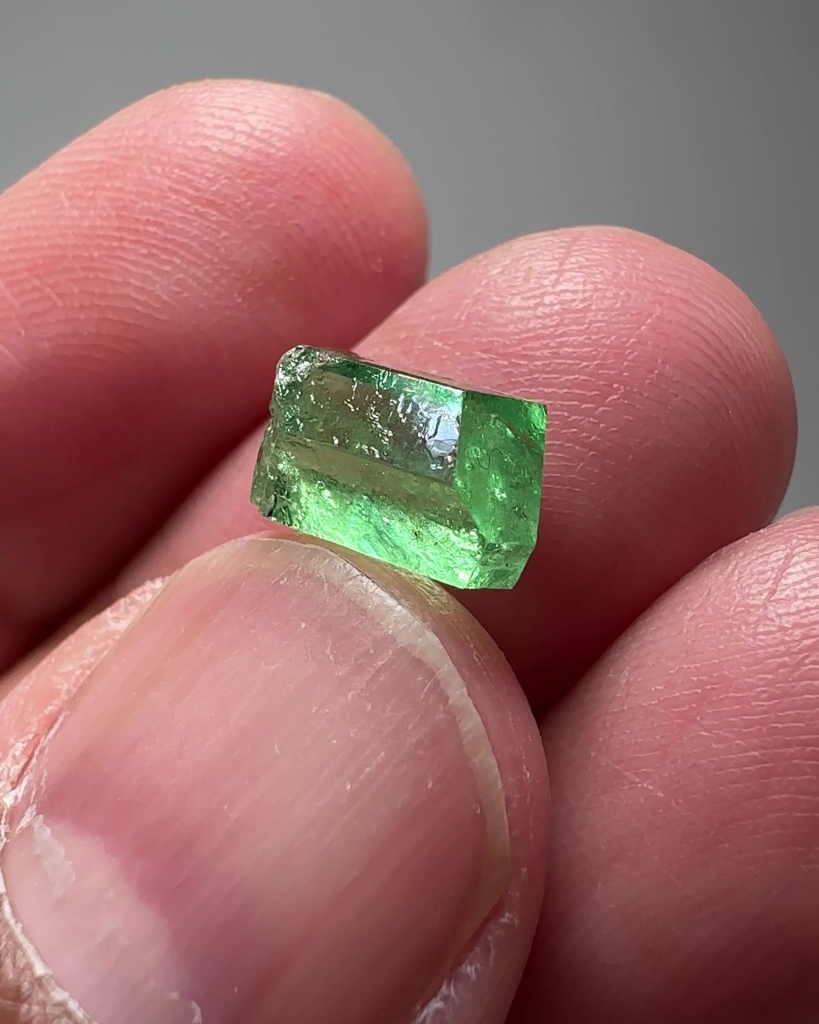 Tsavorite Garnet Crystal, 3.65ct A very unusual Tsavorite crystal from Merelani in Tanzania, Untreated Unheated, see the photos taken in different lights